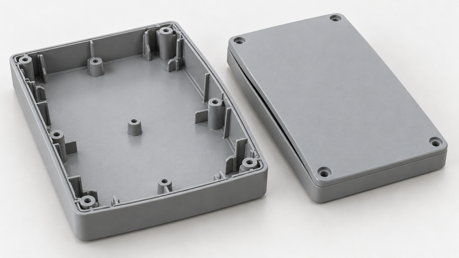 Concept illustration of a warped injection molded enclosure and an uneven gap between mating parts.